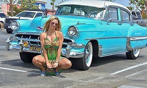 Colorfully dressed blonde MILF posing seductively outdoors and indoors